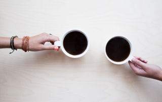 Two coffee mugs: Nipping Issues in the Bud with a quiet word