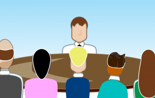 Hospitality Manager meeting employees. Essential HR Skills for Hospitality Managers