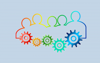 Graphic of outline of head and shoulders of 5 people joined underneath by cogs. Strategic People Plan